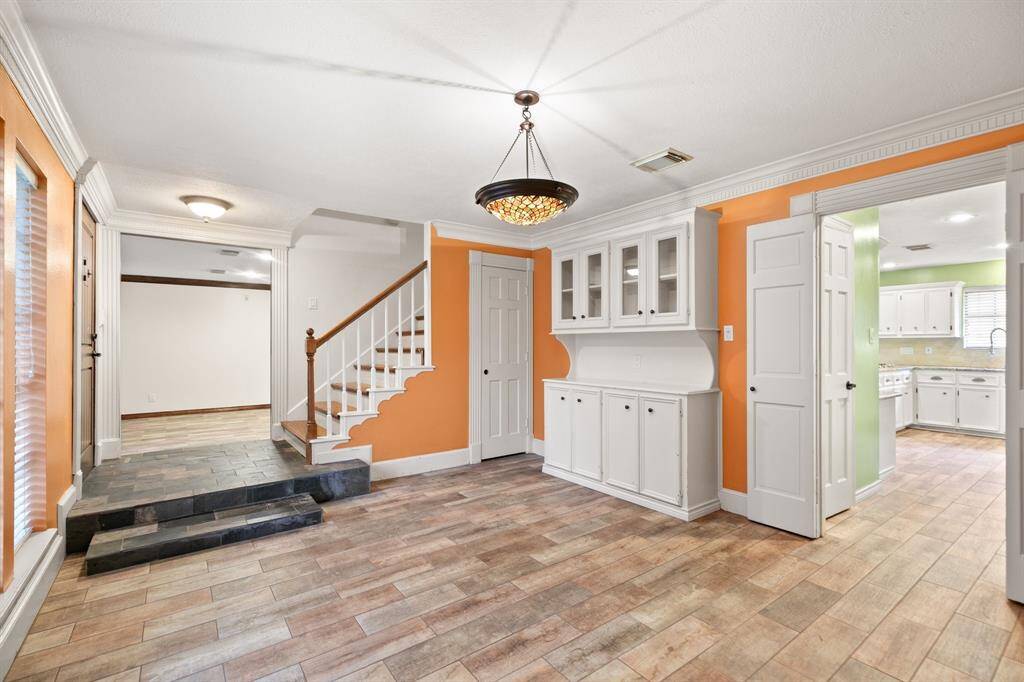 Closet space under the stairs.