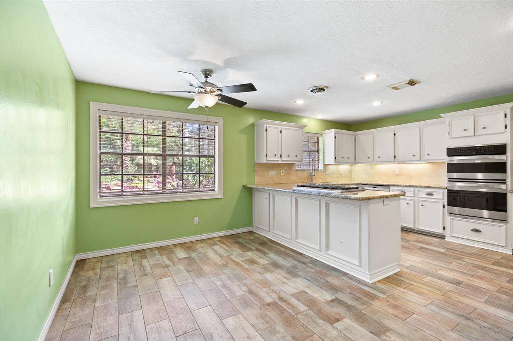 Kitchenette can easily fit a table of 6.