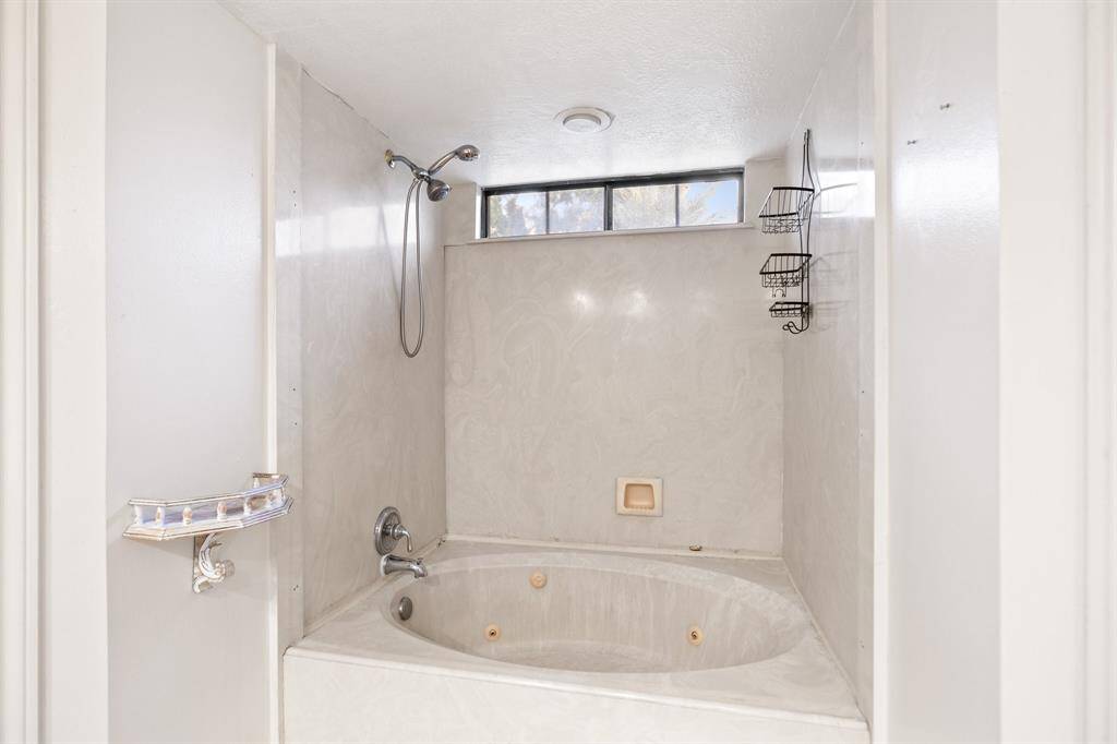 Soaking tub/shower combo.
