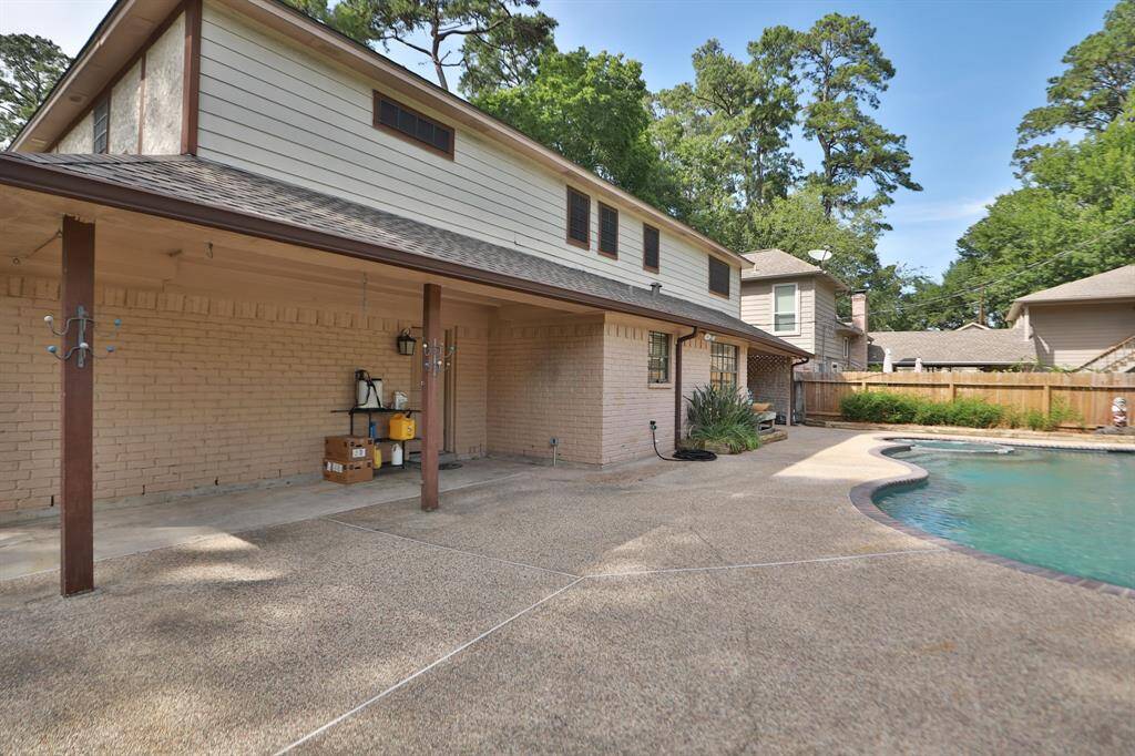 Two outdoor patios.  One off of the den and the other off of the garage.