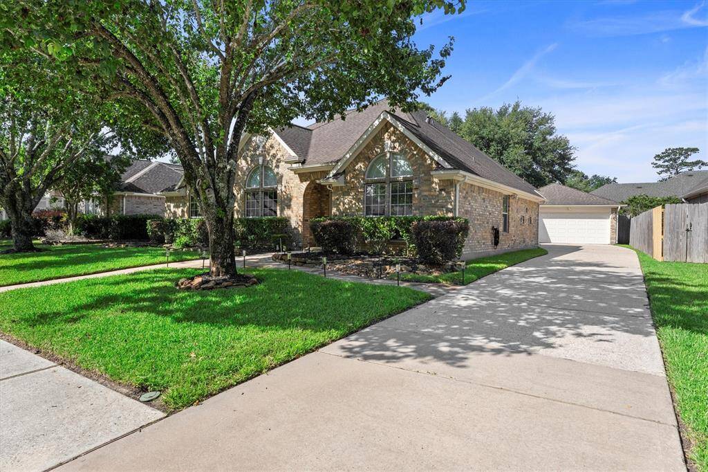 Detached 2 car garage plus long driveway for additional parking!
