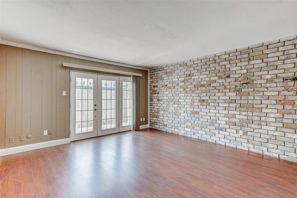 Original brick wall adds character to the home.