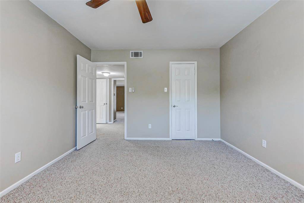 1st bedroom on the 2nd floor with walk-in closet.
