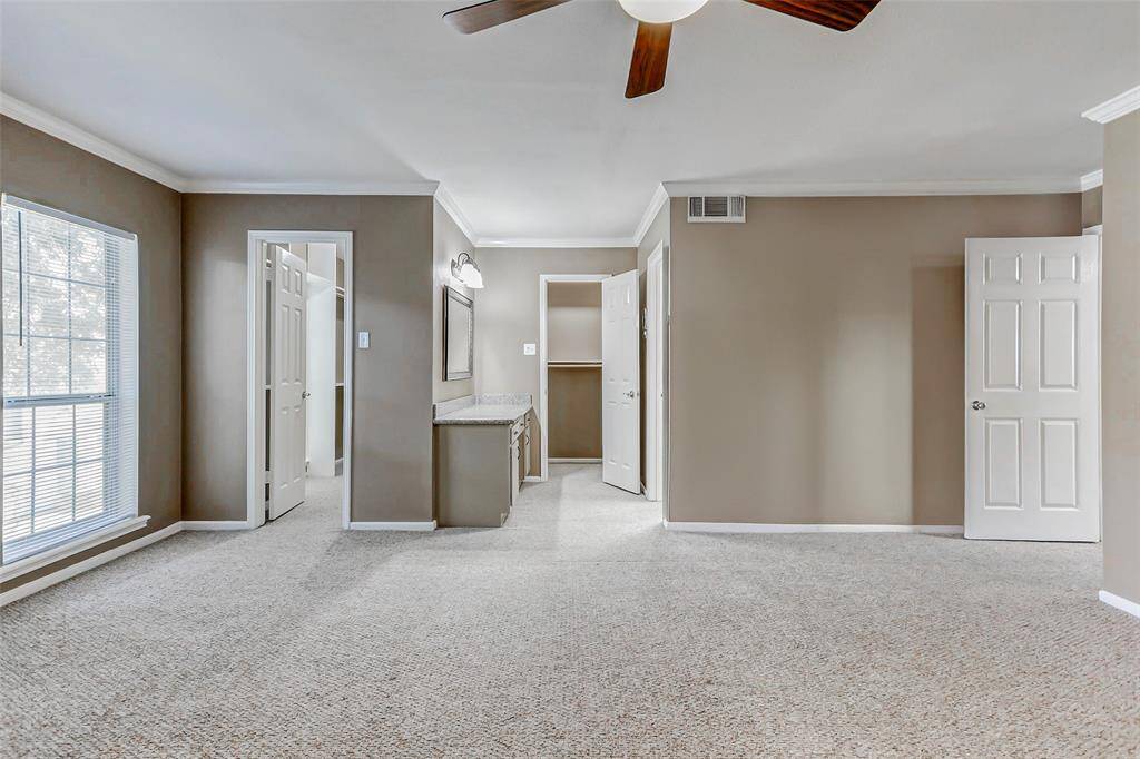 Two closets in the primary bedroom.