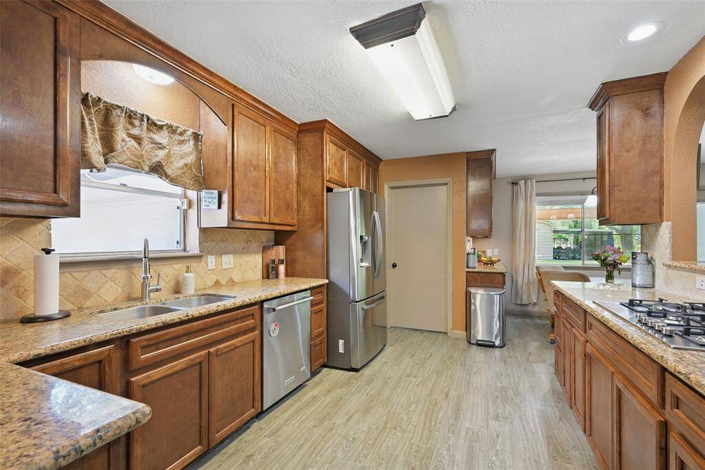 Remodeled kitchen with a lot of storage and counter space. Perfect for family dinners and weekends with friends.