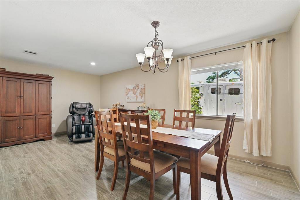 Currently used as a formal dining room and study. Has plenty of space for a pool table or could be a second living space.
