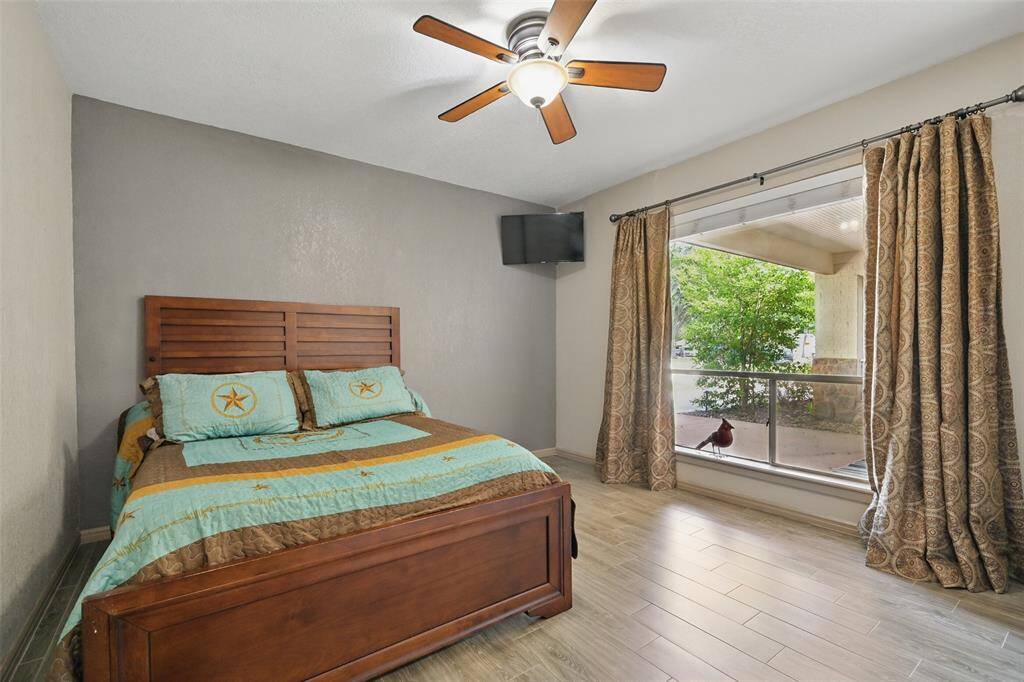 One of three secondary bedrooms. All rooms have nice walk in closets, no carpet. This one features a beautiful picture window. Could also be a study if 4 bedrooms aren't needed.