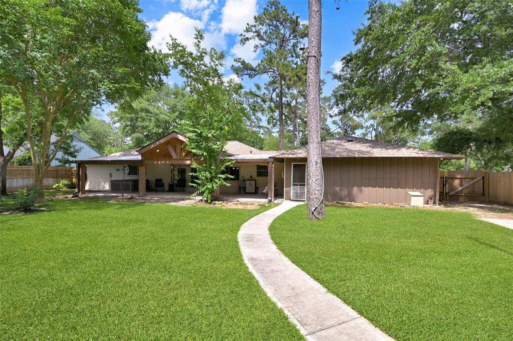 This is the back of the home. The garage is attached and has a door leading to backyard with a walk-way leading to your shop.