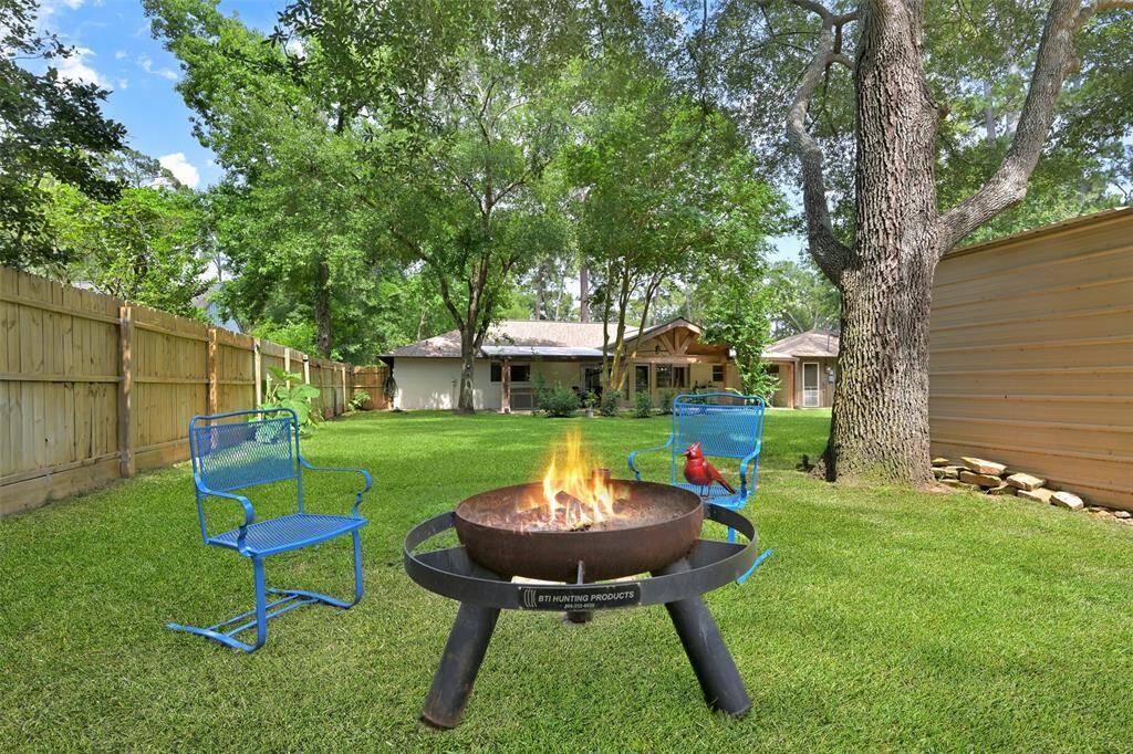 This home has plenty of room for entertaining and offers a space for roasting marshmallows and sitting by the fire. (firepit and chairs not included)