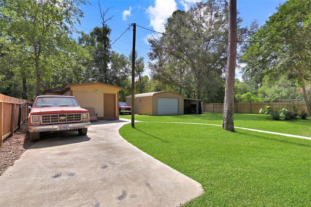 Additional private driveway in back.