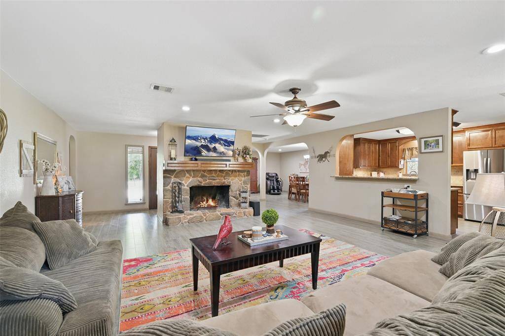 Large family room with plenty of room for family and friends to visit and make memories. Easy to maintain floors, neutral paint.