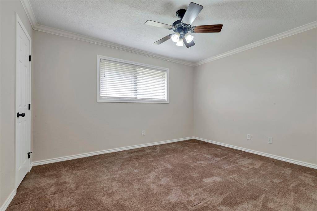 This third bedroom has a similar layout to the other, providing a blank canvas to set up according to your style and preference.