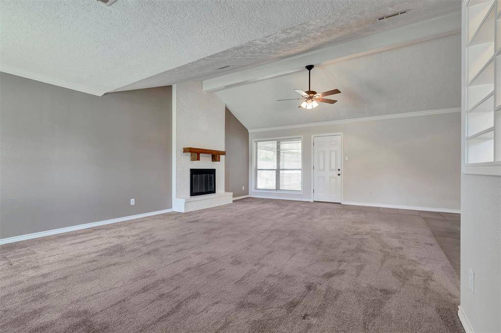 This corner view of the living room gives you a clear perspective of the layout, making it easy to envision your own setup.