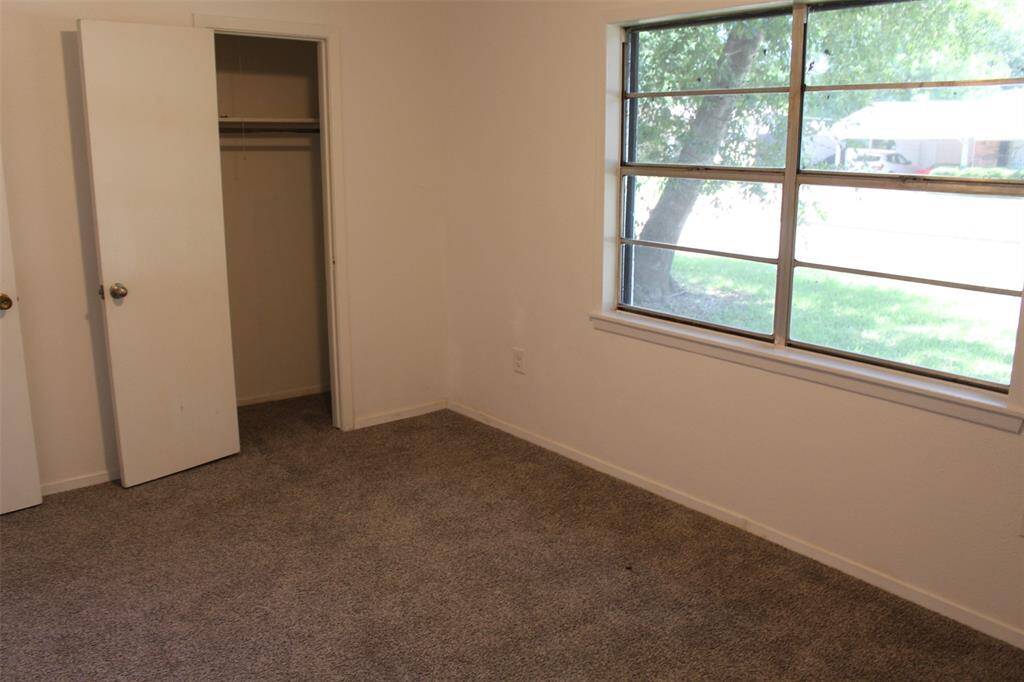 Bedroom 1has a double window for great views of the front  yard.