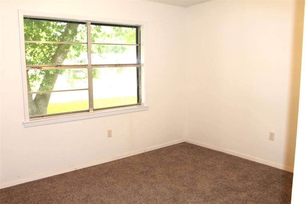 Bedroom 2 also has views of the fron yard.