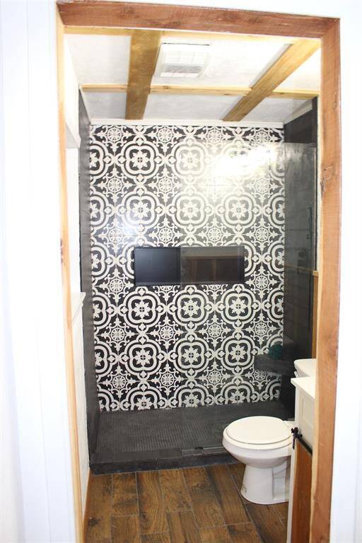Oversized single shower in Primary Bath.