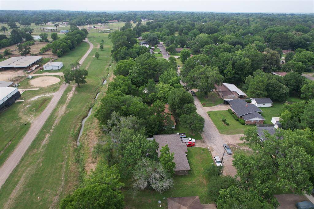 Home is in the middle with the brown roof peaking through all the mature Oak Trees. City Park is located in the top left of this picture.