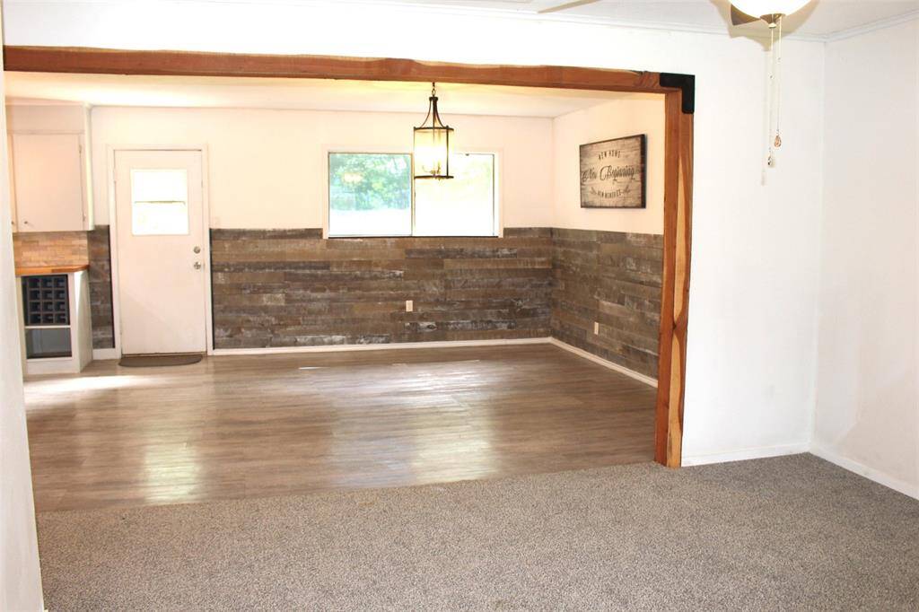 Welcoming Living area complete with entry coat closet.  Opens into dinning area.