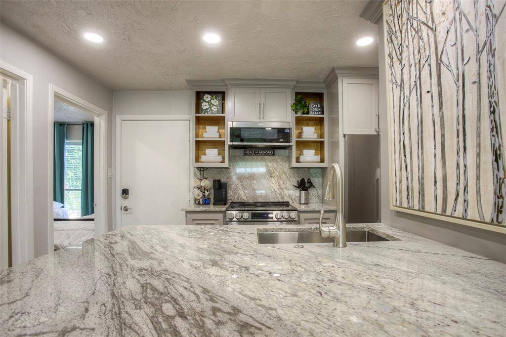 The large breakfast bar is a great place to have a delicious meal or hang out with family and friends.