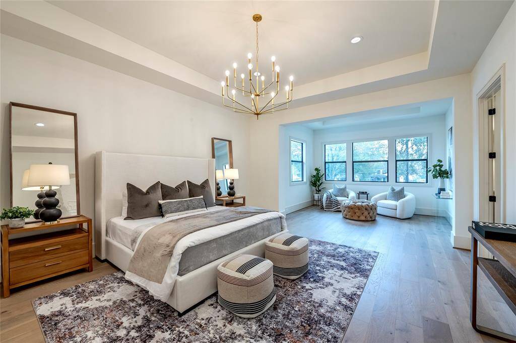 Previous construction by SF Custom Homes.  Primary bedroom with adjacent sitting room.