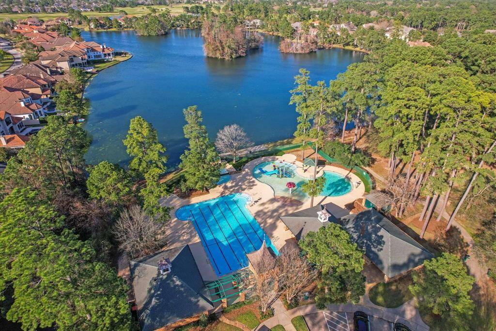 Aerial view of the community recreation center, park and lake.