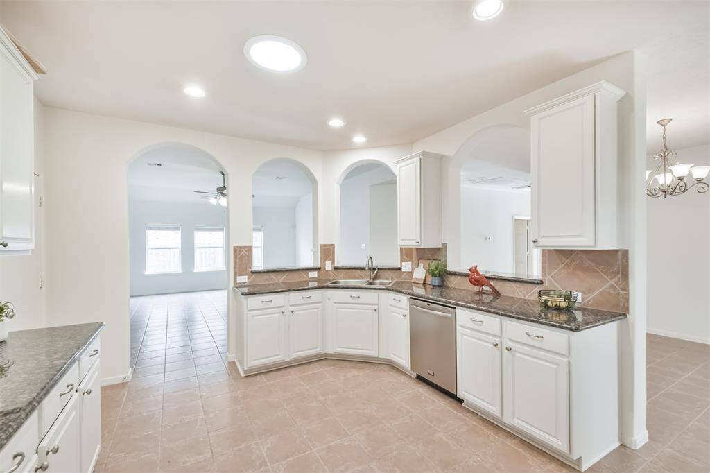 View from the kitchen to family room and also dining room.