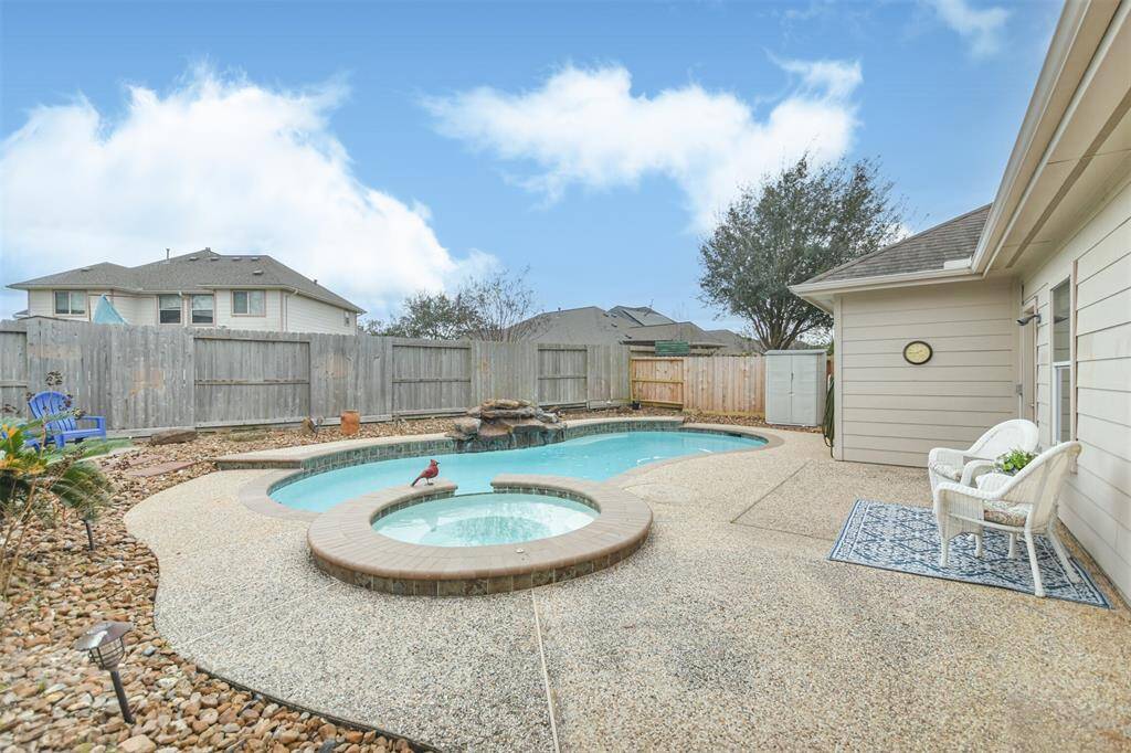 You will enjoy our hot Houston Summers with an ez to maintain backyard and pool.