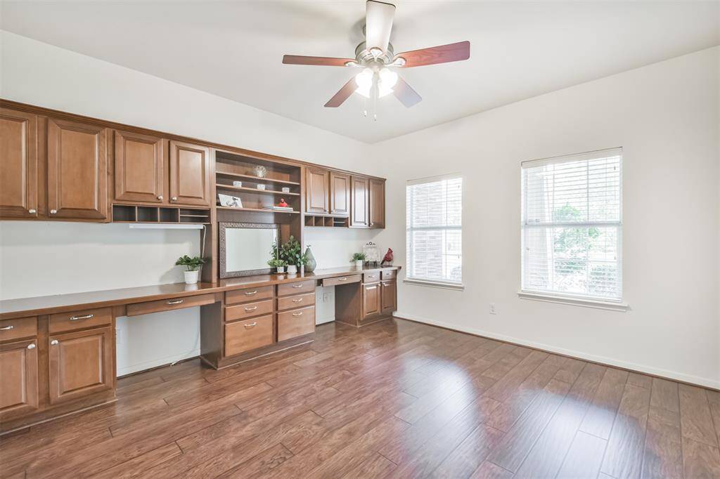 This study is fantastic! Lots of storage space to stay organized and uncluttered. Freshly painted, overlooks front porch.