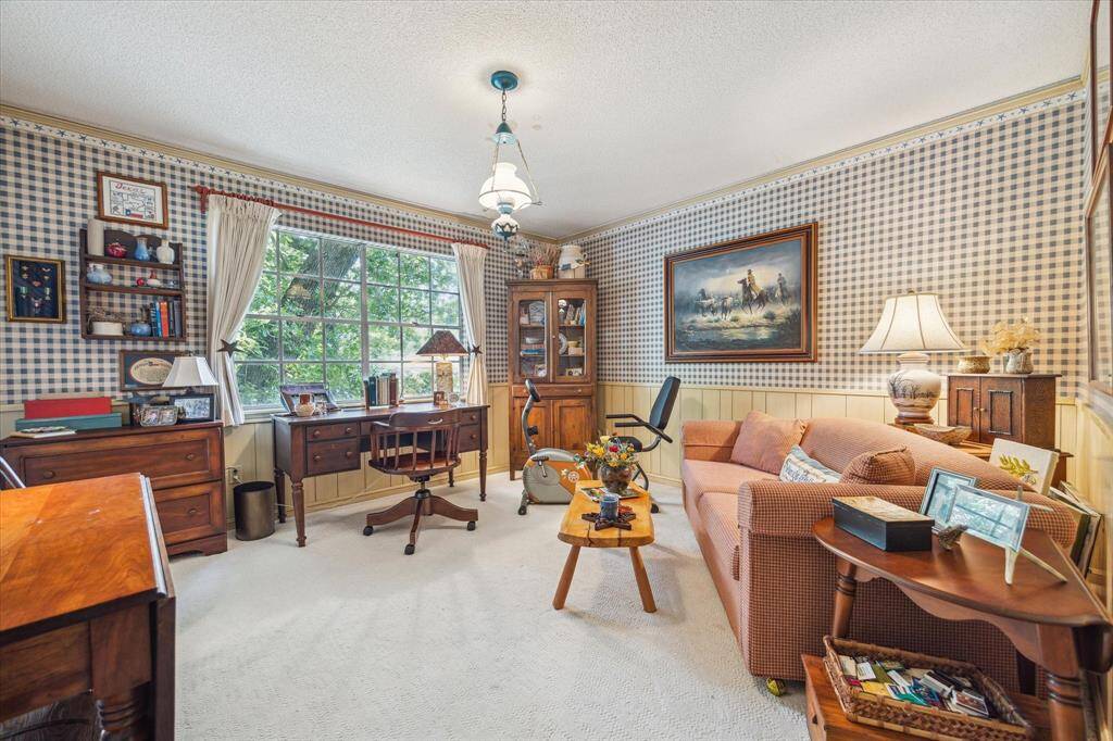 As you reach the second floor, you will find a series of secondary bedrooms that offer comfort, style, and privacy. Each bedroom is thoughtfully designed to provide a serene retreat for family members or guests, with unique features that add to their individual charm.