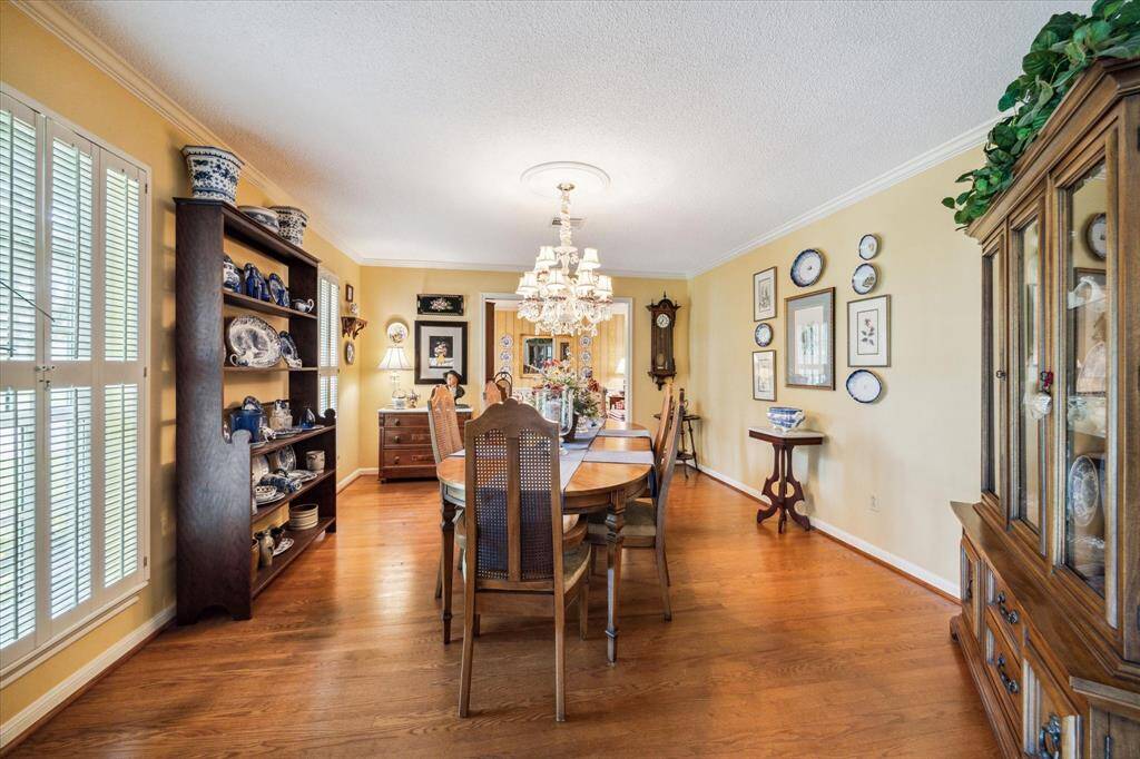 The oversized dining room exudes elegance and comfort, offering ample space for hosting lavish dinner parties and unforgettable gatherings. With room to accommodate a grand dining table and additional furnishings, this impressive space is ideal for entertaining in style and creating memorable moments with family and friends