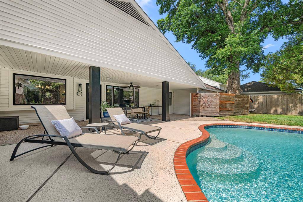 Enjoy relaxing in this wonderful back yard with pool