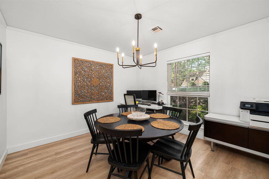 Good-sized dining room overlooks front yard