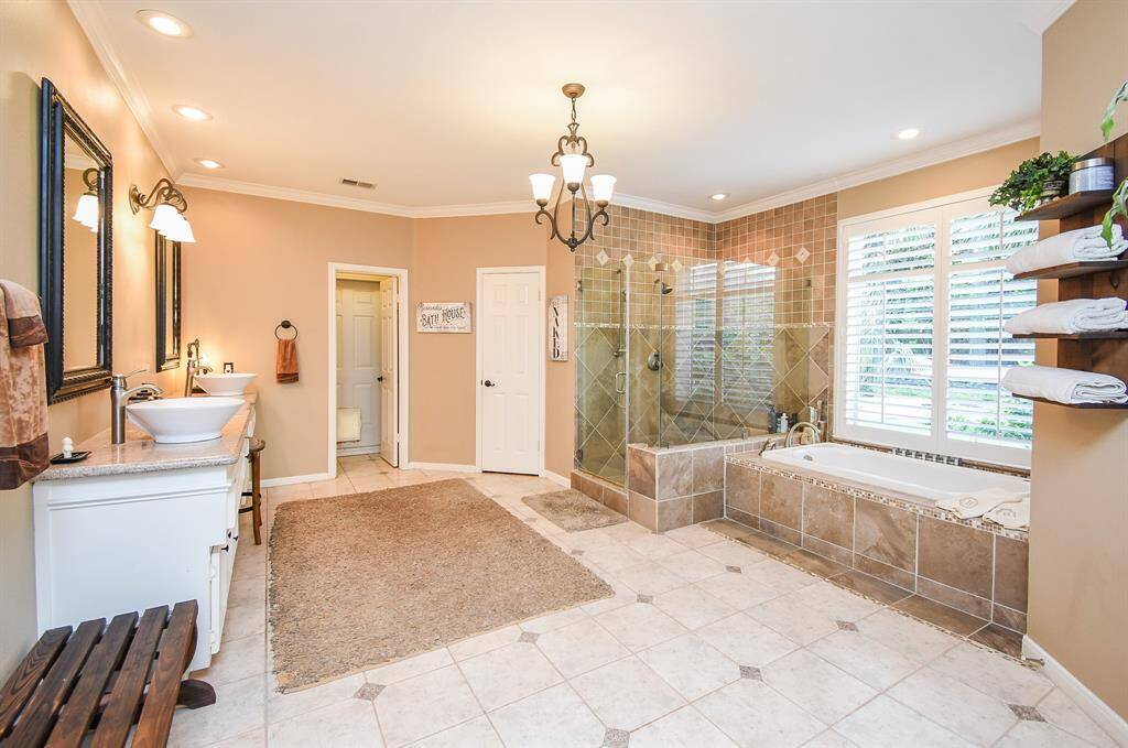 Massive Primary bath with jet tub and walk in shower.
