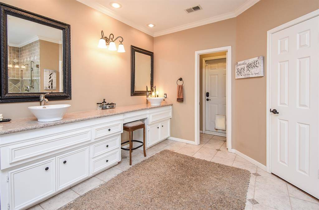 Lots of vanity space! Bathrooom has TWO walk in cloests AND a huge linen closet!