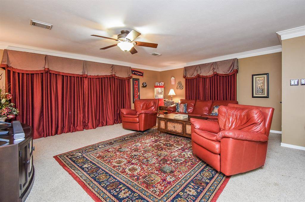 Theater room upstairs from the Primary Bedroom.  Could be yet another bedroom with a massive closet.