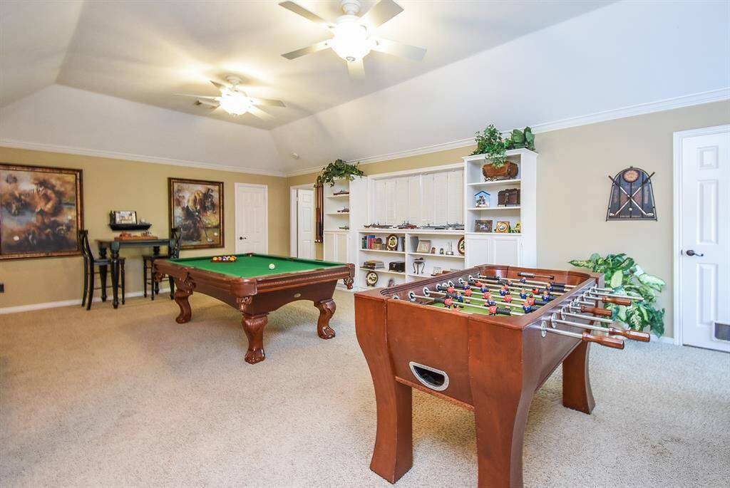 Huge game room! currently supports a pool table, foosball table, dart board, two desks and chess table. Still had plenty of room!