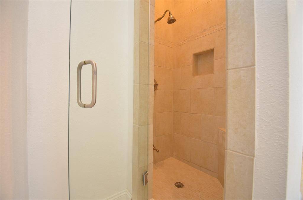 Separate shower in the primary bathroom.