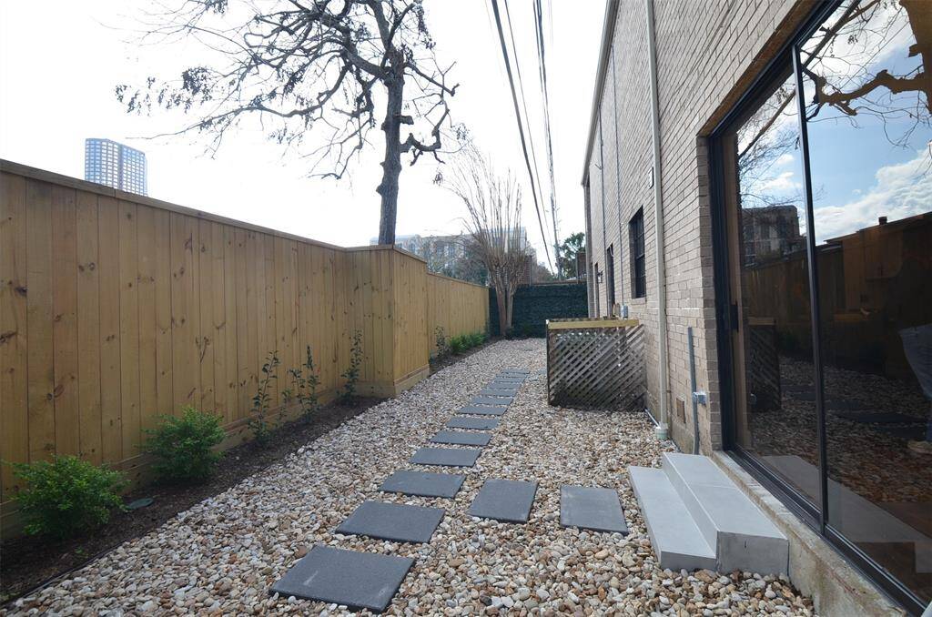 This house has a private yard with a new fence.