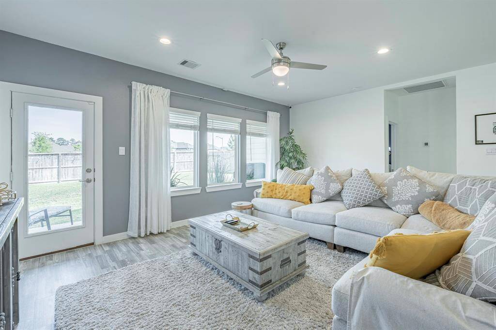 Spacious and welcoming, the living room is ideal for relaxing or gathering with loved ones.