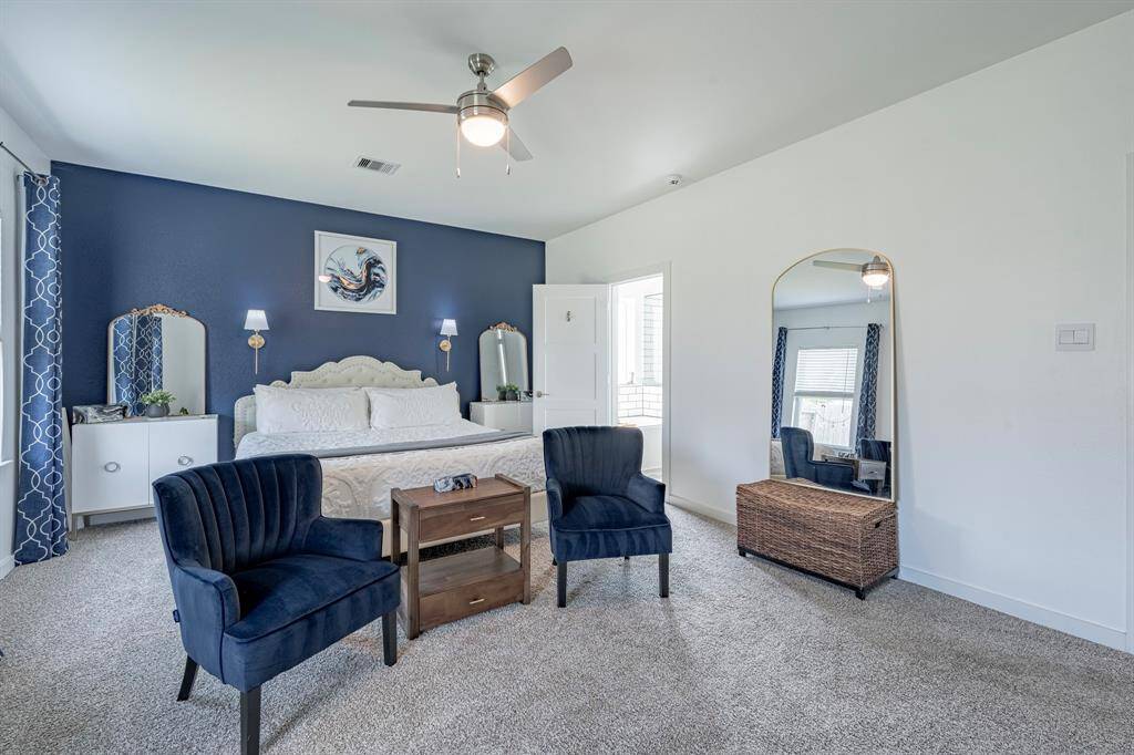 Generously sized with room for a sitting area or reading nook.