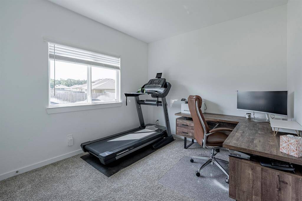Ideal for guests, remote work, or multigenerational living—this versatile first floor bedroom adapts to your needs.