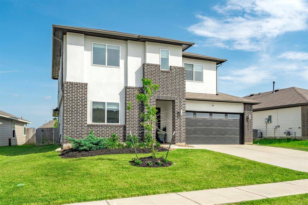 A beautifully maintained exterior sets the tone for this spacious and inviting home.