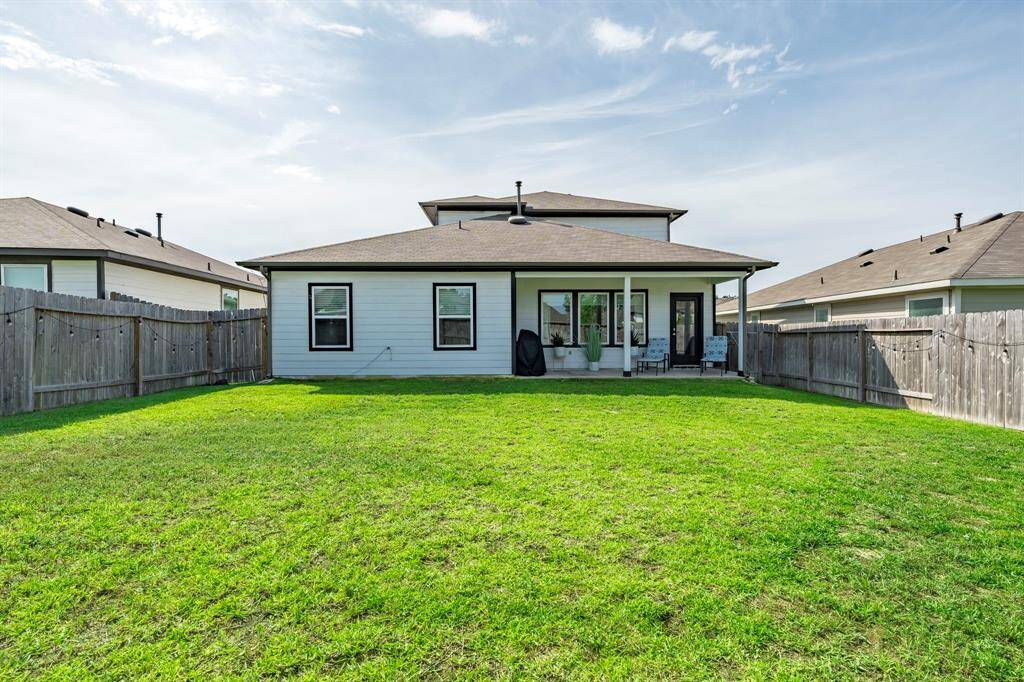 Expansive backyard—ready for entertaining, play, or future enhancements.