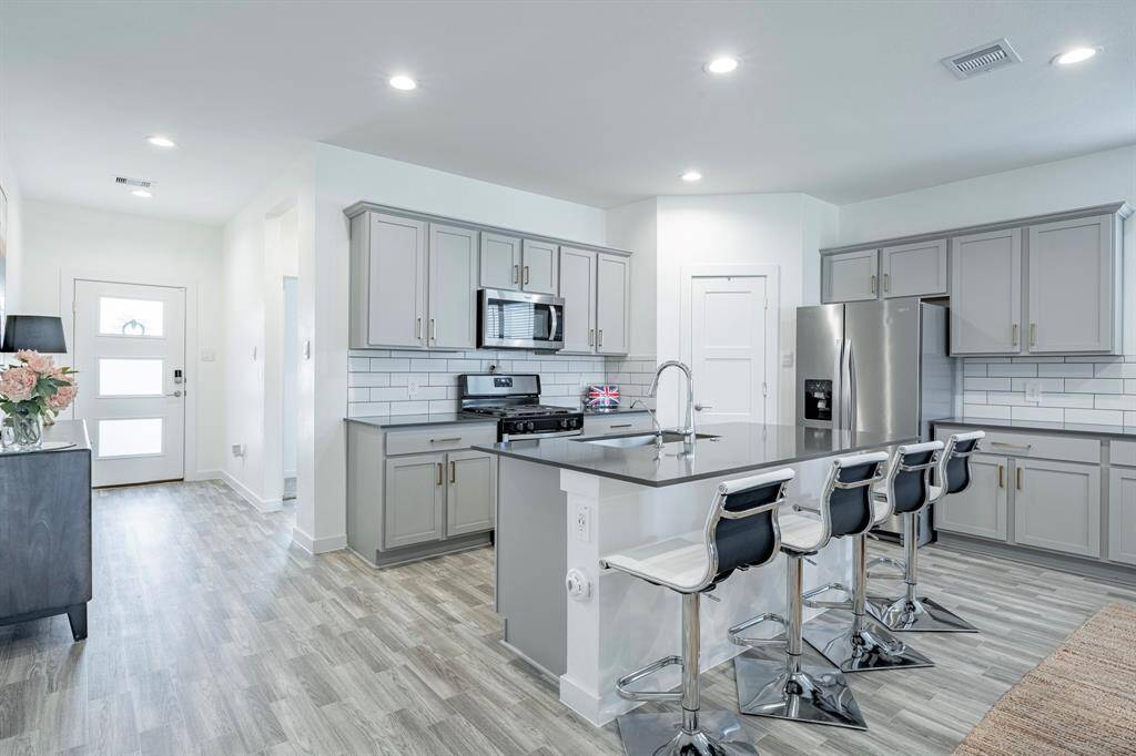 A chef’s dream—spacious counters, modern appliances, and ample storage.