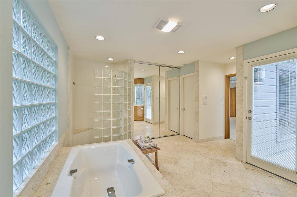 Large soaking tub and separate shower