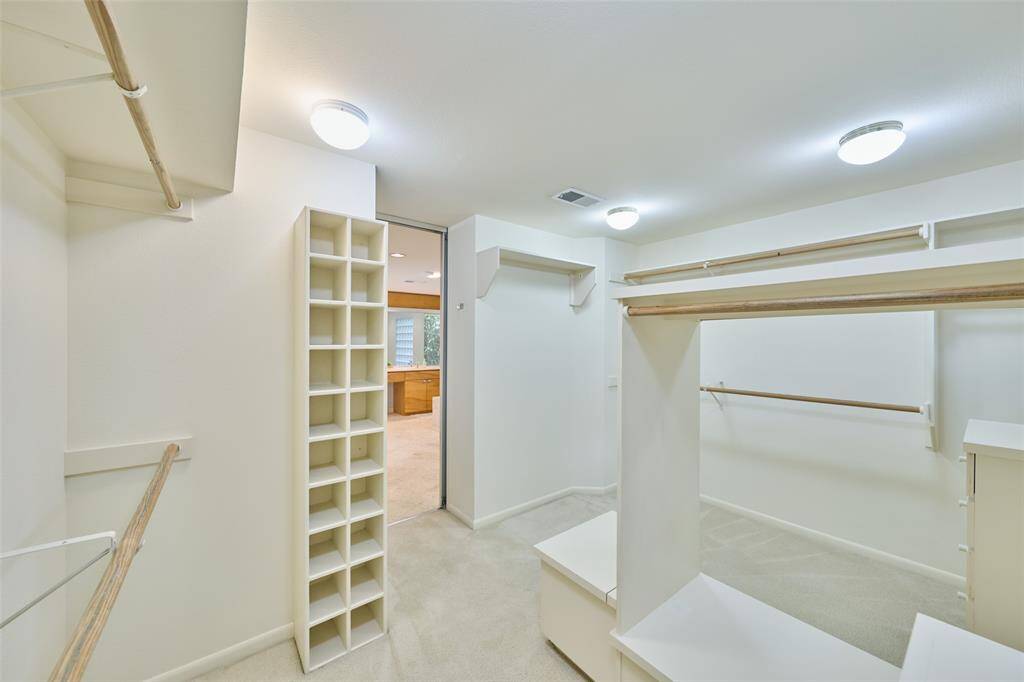 Large primary closet w/convenient shoe storage built-in