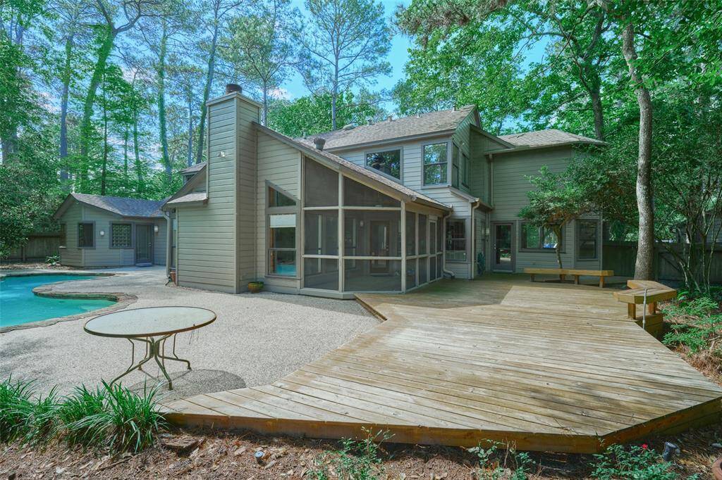 Extensive patio, decking, and screened porch