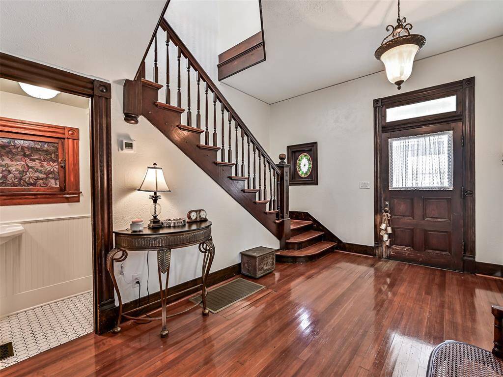 Beautiful front entry and super charming half bath.