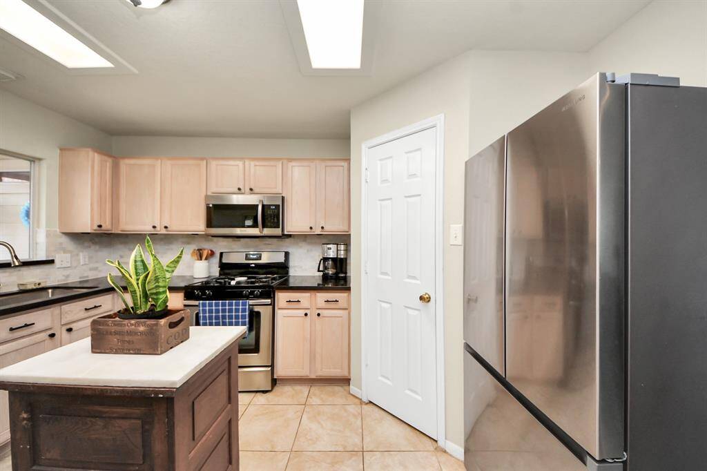 The refrigerator IS INCLUDED.