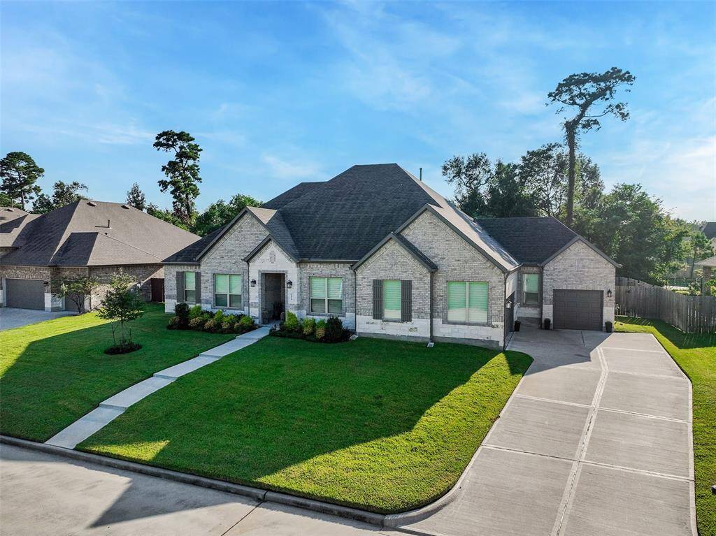 3 Car Garage. Single bay garage features back door access to backyard.